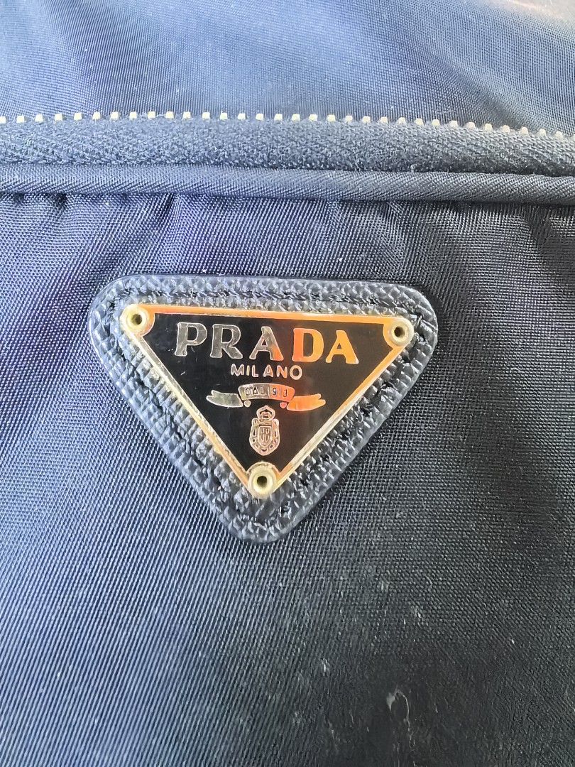 Prada nylon bucket bag (Category: Luxury Bags & Wallets) located in Baguio. Submitted by ashzachary (Listing ID 1453182086, Image 3). Description: Prqda nylon bucket bag 2 way bag Condition :Excellent condition Color rate 10/10 Size : small No issues No flaws Super ganda sa personal Pm. More details Good quality Plsss 📌No Bogus 📌No return MOP What you see is what you get PALAWAN, CEBUNA GCASH AND BDO Reminder😊 We're selling thrifted clothes so