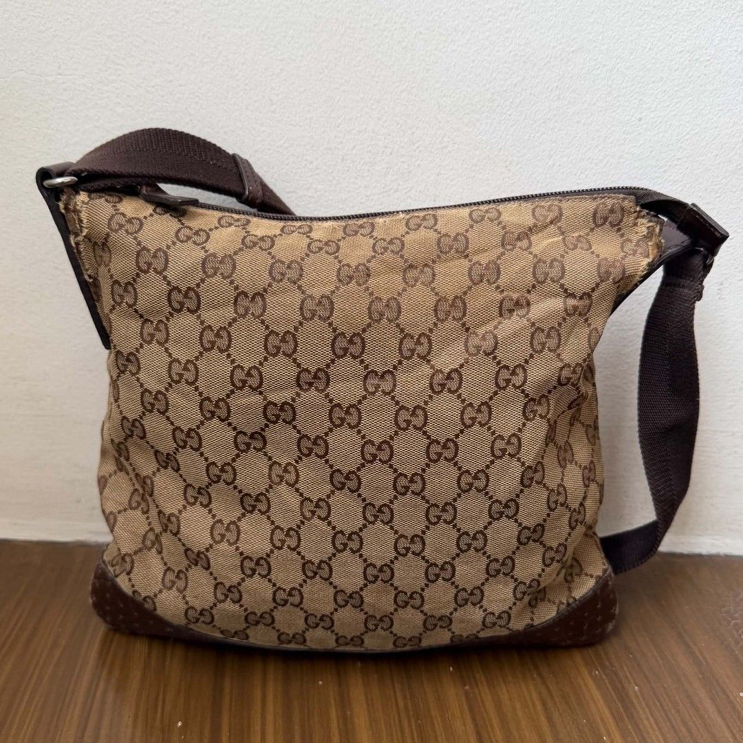 Pre Owned Authentic GUCCI GG Canvas Crossbody Bag (Category: Luxury Bags & Wallets) located in Paranaque City. Submitted by Glamfahd (Listing ID 1453135366, Image 3). Description: Pre Owned Authentic GUCCI GG Bag Inclusion/s: None Condition Well Used condition Marks on exterior Marks on interior Abrasions on exterior visible in close inspection Bag is really a great buy! Please manage your expectations as you are buying an authentic second hand i