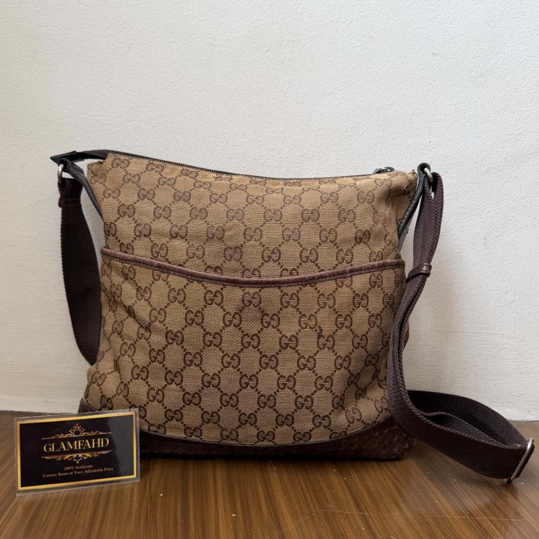 Pre Owned Authentic GUCCI GG Canvas Crossbody Bag (Category: Luxury Bags & Wallets) located in Paranaque City. Submitted by Glamfahd (Listing ID 1453135366, Image 1). Description: Pre Owned Authentic GUCCI GG Bag Inclusion/s: None Condition Well Used condition Marks on exterior Marks on interior Abrasions on exterior visible in close inspection Bag is really a great buy! Please manage your expectations as you are buying an authentic second hand i