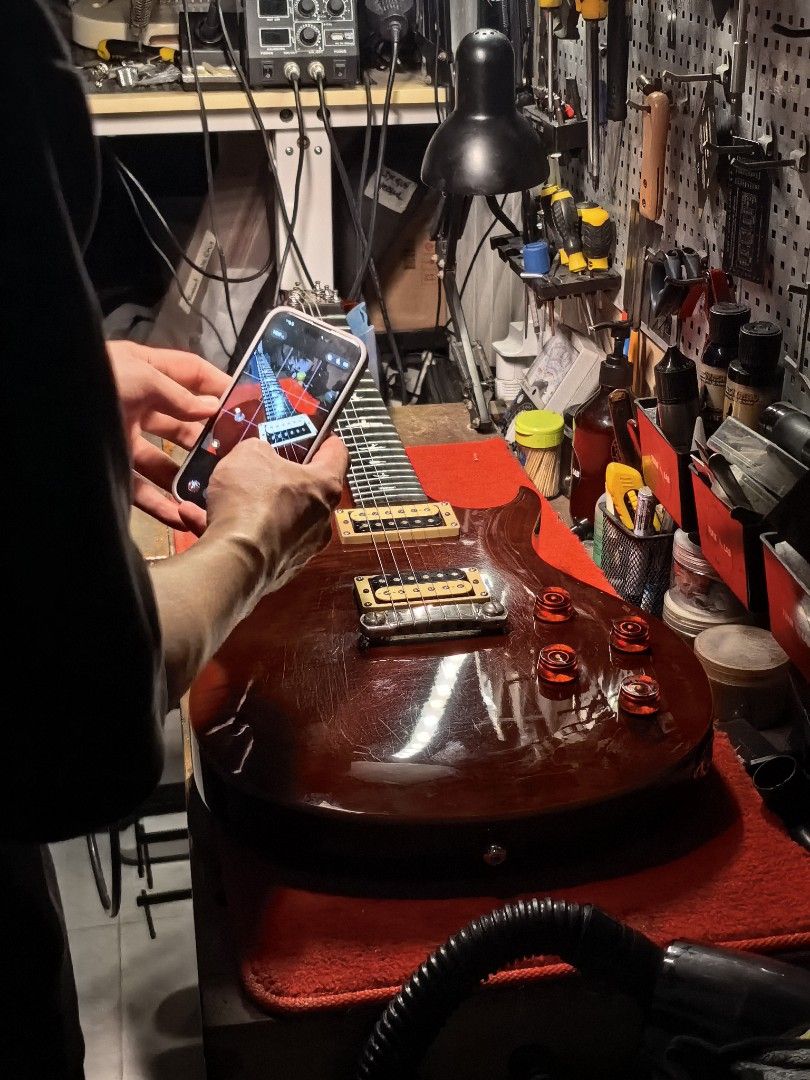 PRS SE 245 Electric Guitar (Category: Musical Instruments) located in Manila. Submitted by eediso10 (Listing ID 1399514683, Image 2). Description: - PRS SE 245 electric guitar - Stunning dark red finish - Equipped with humbucker pickups - Rosewood fretboard with iconic bird inlays - Stop tailpiece for enhanced sustain - Well-maintained and ready for immediate use with papers for authenticity.