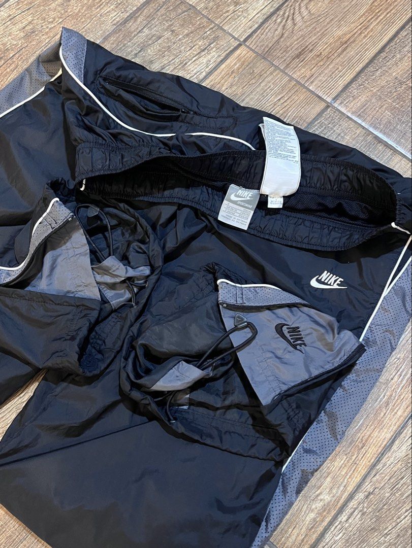 Rare Vintage Nike Trackpants Double Logo (Category: Joggers) located in Dagupan City. Submitted by harvey2005 (Listing ID 1453106043, Image 3). Description: prestine condition color rate 10/10 28-34 waistline 41 length issue: broken toggle stopper due to its age.