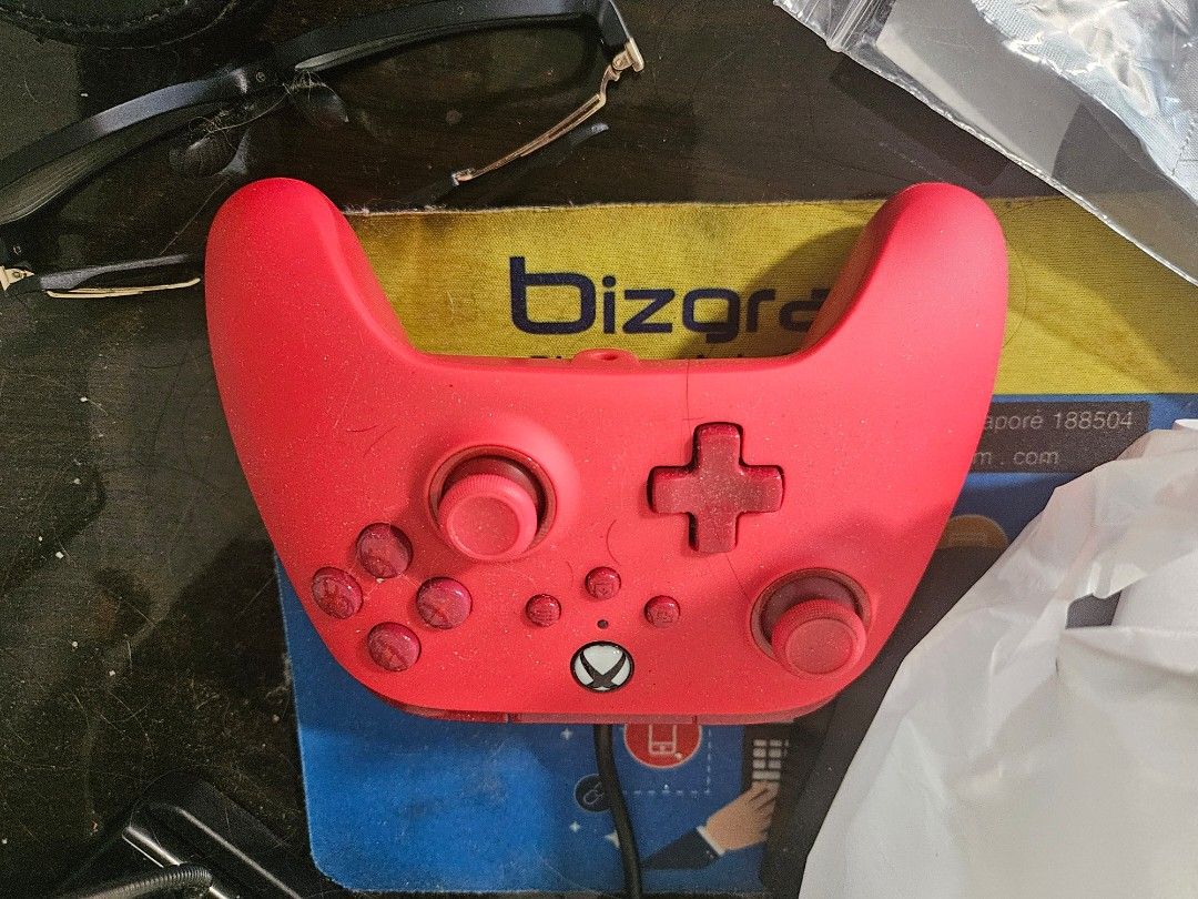 Red Xbox Wired Controller (Category: Controllers) located in Singapore. Submitted by kiryu17 (Listing ID 1453077159, Image 2). Description: - Red Xbox Wireless Controller - Fully functional, works great - close to no cosmetic scuffs and dust from normal use - Plenty of life remaining - Ideal for a spare or replacement controller.