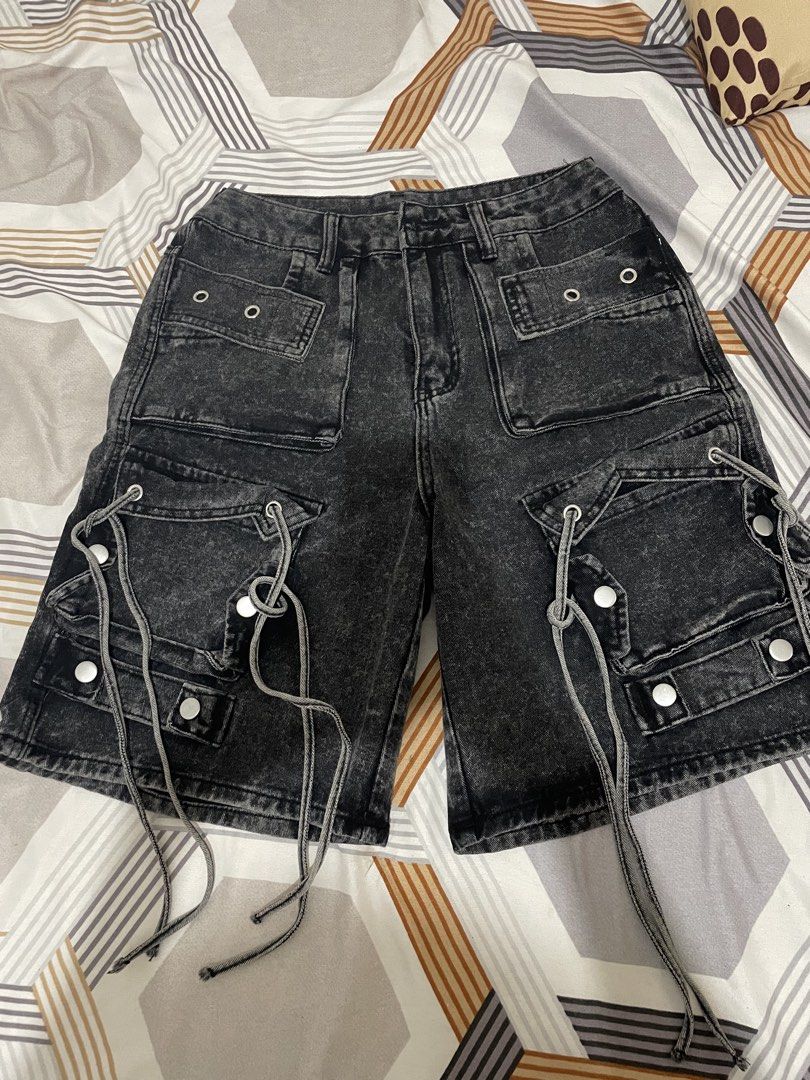 ROMWE MEN Black Wash Cargo Shorts with Drawstrings (Category: Shorts) located in Tanza. Submitted by declutchedd_dd (Listing ID 1453176746, Image 1). Description: - ROMWE MEN black wash cargo shorts - Durable denim material - Multiple functional pockets - Stylish eyelet details - Adjustable side drawstrings for a custom fit - Ideal for a streetwear aesthetic - Brand new, comes in original packaging - shein brand - no issue - sinukat lang rfs: mal