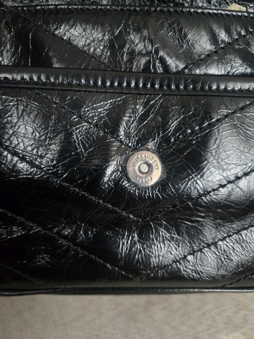 Saint Laurent Niki (Category: Luxury Bags & Wallets) located in Manila. Submitted by shla.dln (Listing ID 1453134624, Image 3). Description: - Japan bought thru pasabuy - Pls self authenticate - No heavy flaws - Comes with care cards and dust bag.
