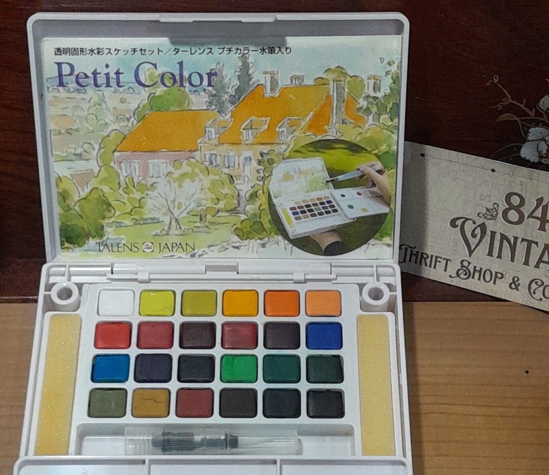 Sakura Petit Color Solid Watercolor Paint Set (Category: Stationery & School Supplies) located in Las Pinas. Submitted by 84vintage (Listing ID 1453161280, Image 2). Description: Sakura Petit Color Solid Watercolor Paint Set, featuring a compact case ideal for sketching on the go. The set includes a portable water brush for painting without needing a separate water container. The lid functions as a divided palette for mixing colors, while the cas