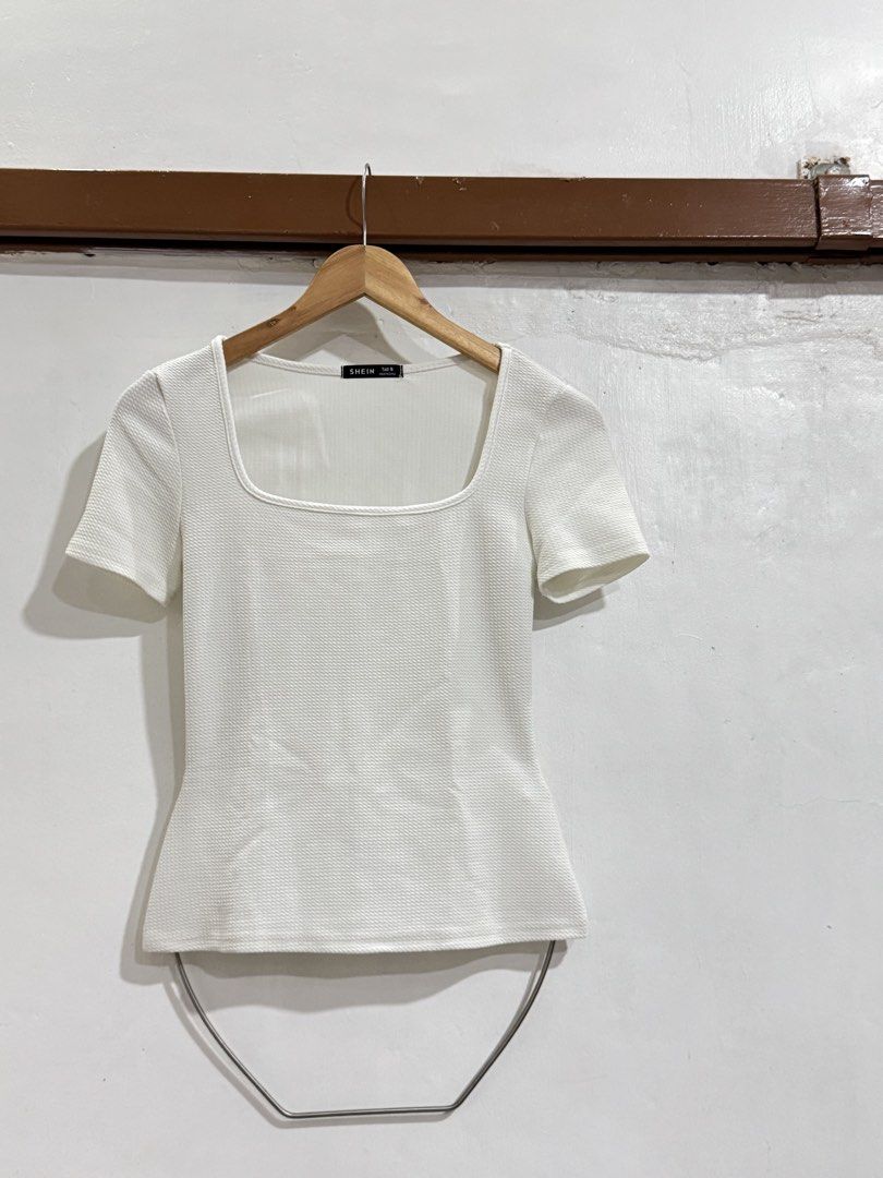SHEIN White Textured Square Neck Top Tall S (Category: Blouses) located in Manila. Submitted by acluttering (Listing ID 1453164131, Image 1). Description: - SHEIN white textured top - Square neckline - Short sleeves - Fitted silhouette - Size: Tall S - Made in China - Versatile for casual or dressed-up occasions.