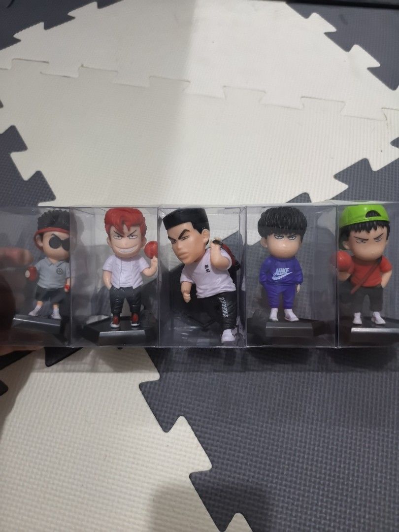 Slam Dunk Anime Figurines Set of 5 (Category: Figurines & Statues) located in Manila. Submitted by eediso10 (Listing ID 1453080721, Image 1). Description: - Set of 5 Slam Dunk anime figurines - Includes Hanamichi Sakuragi, Kaede Rukawa, Ryota Miyagi, Takenori Akagi, and Hisashi Mitsui - Each figurine comes in its own clear display case - Ideal collectible item for any Slam Dunk enthusiast.