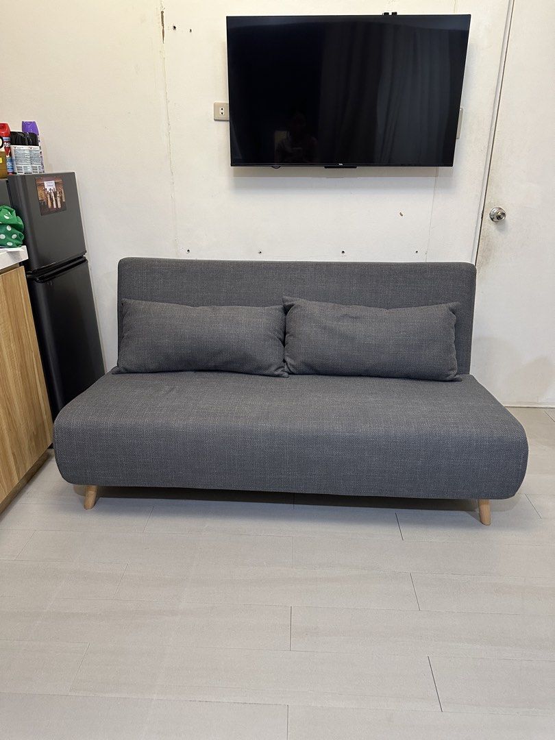 Sofa Bed with Pillows (Category: Sofas) located in Valenzuela. Submitted by __prelovedbyjd (Listing ID 1453077099, Image 2). Description: Queen size bed when laid flat Great quality Bought from CW Home Depot Can do 3 sizes (sofa, half bed, full queen size bed) No issues, no damages, no stains Loc: Valenzuela City Lalamove pick up only.