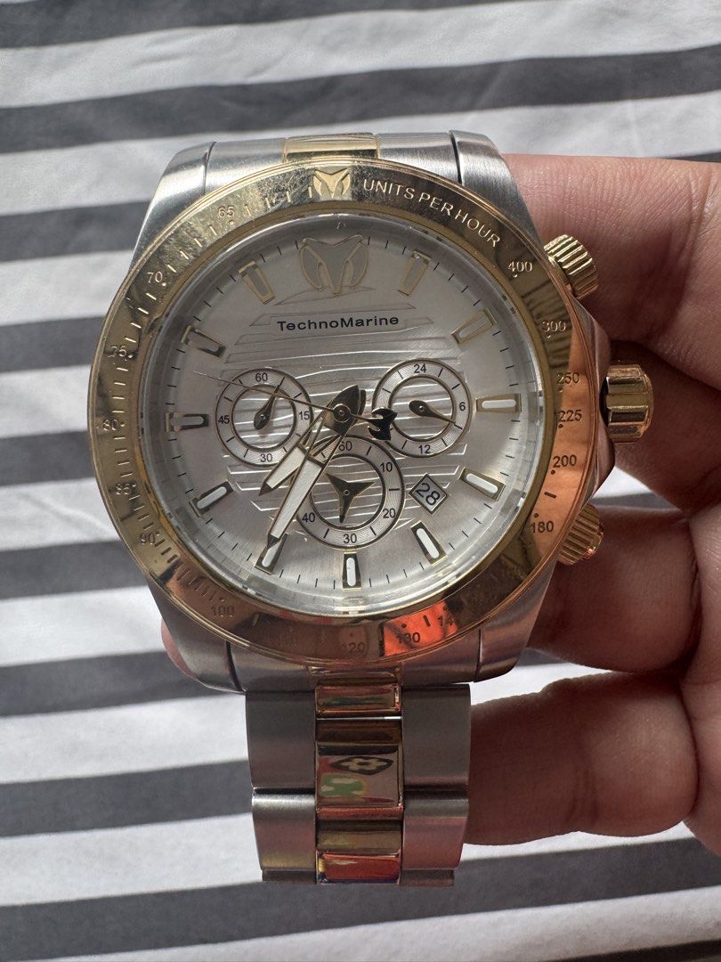 TechnoMarine Manta Ray Chronograph Watch (Category: Luxury Watches) located in Makati City. Submitted by kpmg111 (Listing ID 1453148659, Image 3). Description: - Pre-owned TechnoMarine Manta Ray watch - Stainless steel casing - Gold accents on crown and pushers - Water resistant up to 20ATM/660FT - Reliable Japan movement - Model Number: TM-2201245 - Serial Number: 10341162.