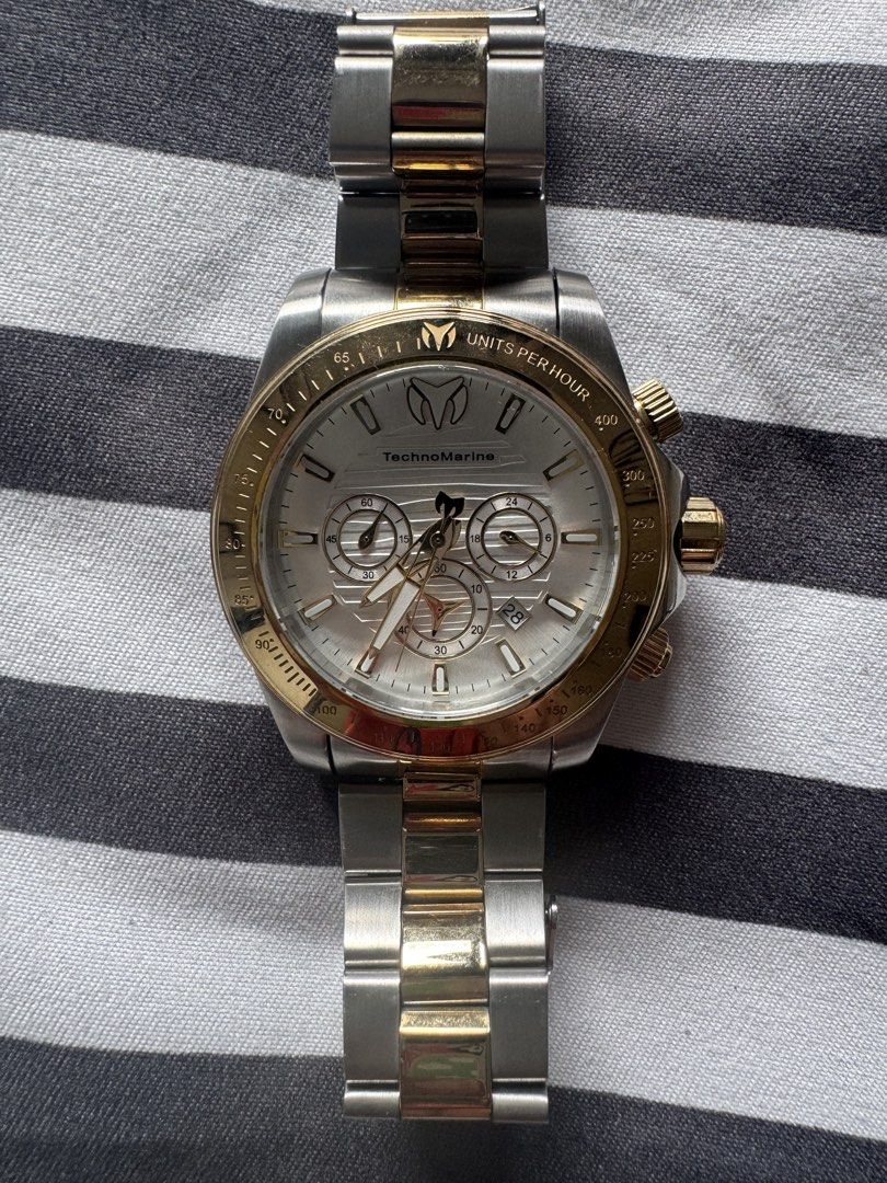 TechnoMarine Manta Ray Chronograph Watch (Category: Luxury Watches) located in Makati City. Submitted by kpmg111 (Listing ID 1453148659, Image 1). Description: - Pre-owned TechnoMarine Manta Ray watch - Stainless steel casing - Gold accents on crown and pushers - Water resistant up to 20ATM/660FT - Reliable Japan movement - Model Number: TM-2201245 - Serial Number: 10341162.