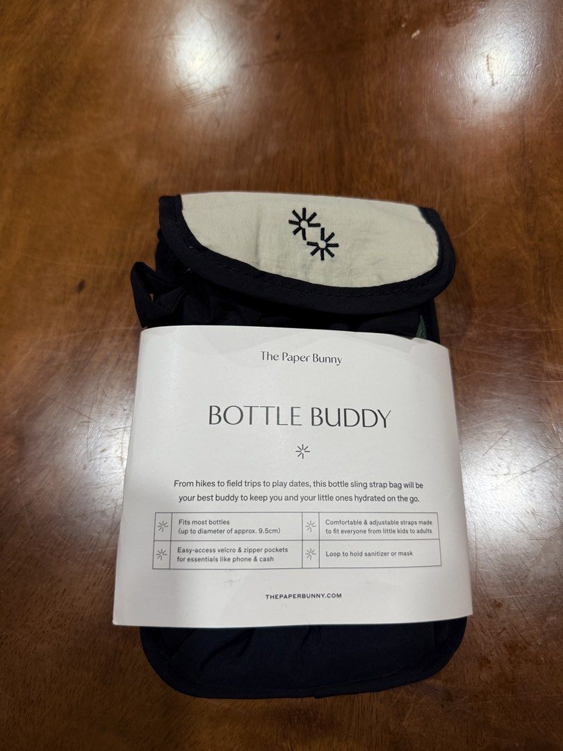 The Paper Bunny Bottle Buddy Sling Bag (Category: Cross-body Bags) located in Carmona. Submitted by prelovedbyallia (Listing ID 1453078402, Image 2). Description: The Paper Bunny Bottle Buddy Sling Bag • 1,300 each 🤍 • Buy both for only 2,400 (Save 200!) ⭐️ •Brand new and unused with original paper wrap • Perfect for keeping your water bottle and everyday essentials within easy reach. Great for errands, travel, walks, gym, school, or work. •Fits