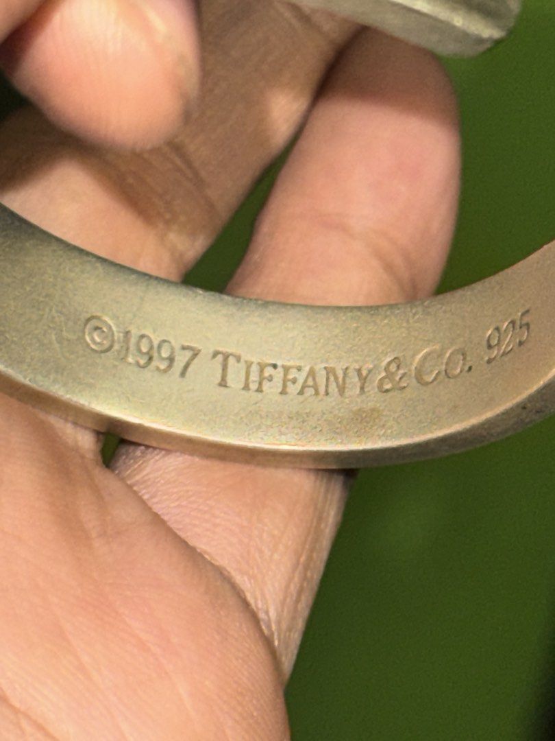 Tiffany & Co silver bangle (Category: Bracelets) located in Imus. Submitted by juantosell777 (Listing ID 1453186038, Image 3). Description: - Authentic Tiffany & Co. cuff bracelet - Crafted from 925 sterling silver - Features 'T & CO', '925', '1997', and '1837' hallmarks - Classic and timeless Tiffany design .