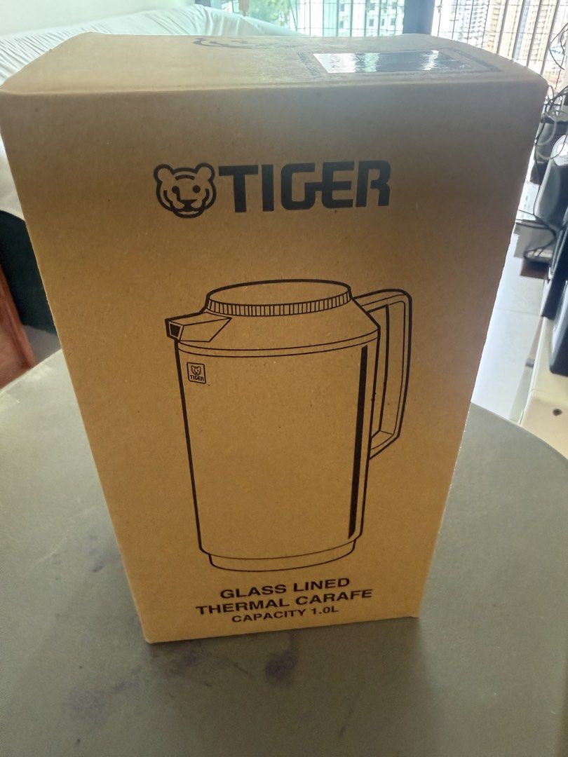 Tiger Glass Lined Thermal Carafe 1.0L (Category: Water Bottles & Tumblers) located in Manila. Submitted by sarsy (Listing ID 1453075237, Image 1). Description: - Tiger Brand Thermal Carafe - Capacity: 1.0 Liters - Glass-lined interior for optimal temperature retention - Keeps beverages hot or cold for extended periods - Comes with original packaging - Ideal for home or office use.