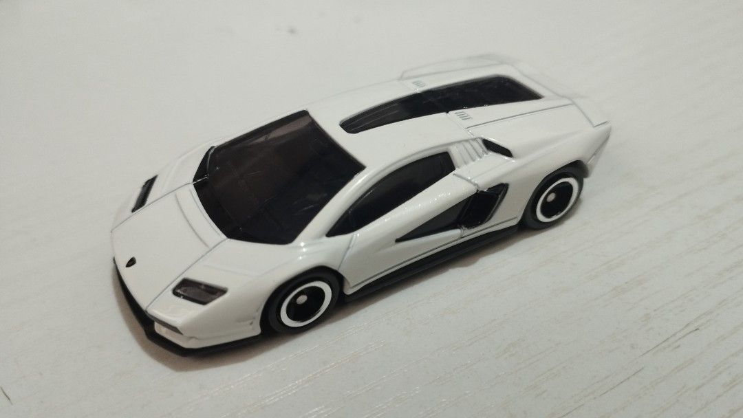 Tomica Lamborghini Countach LPI 800-4 (Category: Vehicle & Diecast Models) located in Santa Cruz. Submitted by .rx-78-2 (Listing ID 1453101800, Image 1). Description: - White Lamborghini Countach - Features nice body details and tinted windows - Black wheels with white trim.