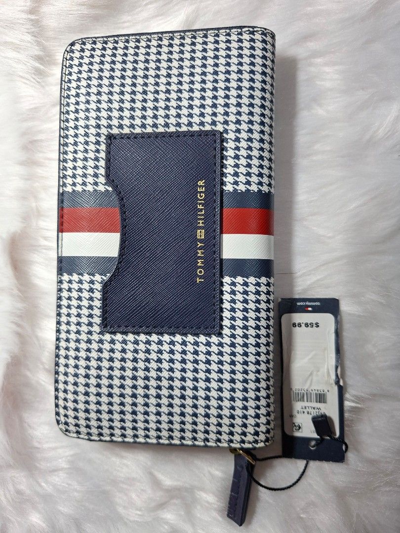 Tommy Hilfiger long wallet (Category: Luxury Bags & Wallets) located in Manila. Submitted by maharlikakzy (Listing ID 1453194024, Image 1). Description: 💯 Original TH wallet Dimension: 20cm L x 11cm H x 3cm W Tricolor long wallet Unused Rfs: Decluttering.