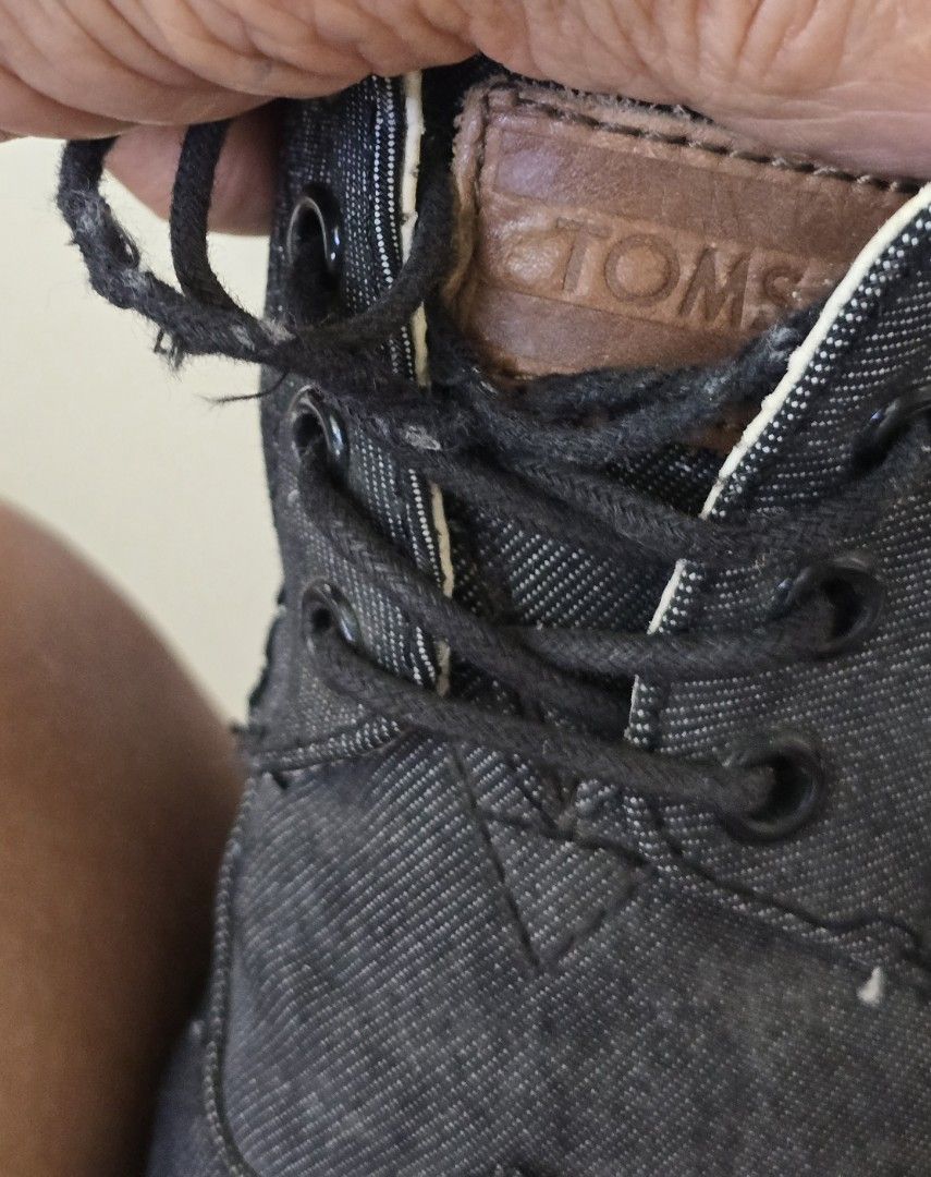 TOMS Denim Chukka Boots (Category: Boots) located in Cebu City. Submitted by henry_007 (Listing ID 1453195161, Image 1). Description: - TOMS chukka boots - Dark denim material - Lace-up style - Laces show some wear - Ideal for casual wear.