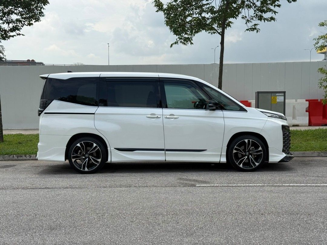 Toyota Voxy Hybrid 1.8 SZ 7-Seater (A) (Category: Used Cars) located in Singapore. Submitted by preciseauto (Listing ID 1453075540, Image 2). Description: 🔥🔥BOSS SAY ALL MUST GO CLEARANCE SALE🔥🔥 🚨CHEAPEST CARS IN THE MARKET🚨 🚘$500 DRIVEAWAY🚘 🏦LOWEST INTEREST FROM 1.48%🏦 🟢1 YEAR WARRANTY🟢 🔧FREE 1 YEAR SERVICING🔧 🏬 Vehicle 120 Points INSPECTION CHECK By In House Workshop BEFORE we put them for SALE 🚕 PHV Drivers Welcomed 🔁 High Tra