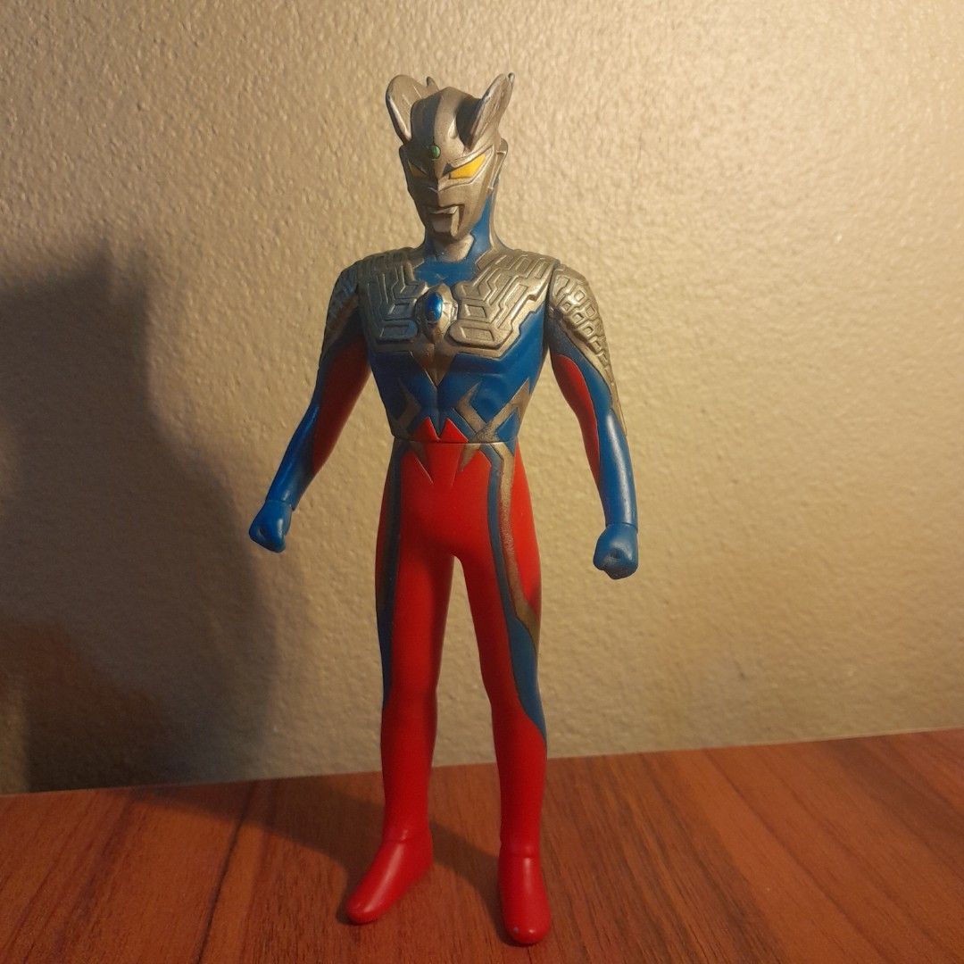 Ultraman Zero Sofubi (Category: Toys & Games) located in Kota Bharu. Submitted by alepp15 (Listing ID 1453174010, Image 1). Description: Original Bandai. Has some bruises and marks. It's around 6 to 6.5 inches. If interested, please message me before buying..