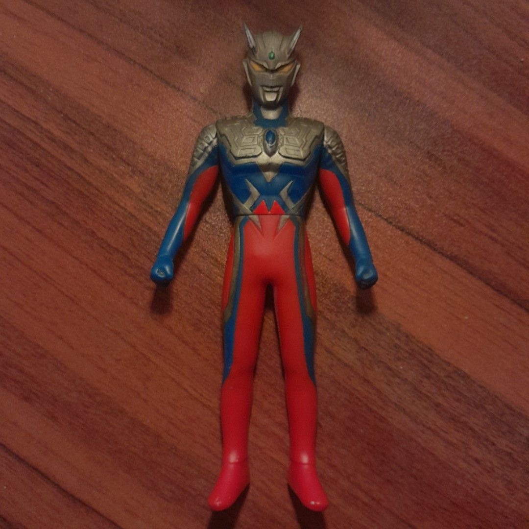 Ultraman Zero Sofubi (Category: Toys & Games) located in Kota Bharu. Submitted by alepp15 (Listing ID 1453174010, Image 2). Description: Original Bandai. Has some bruises and marks. It's around 6 to 6.5 inches. If interested, please message me before buying..
