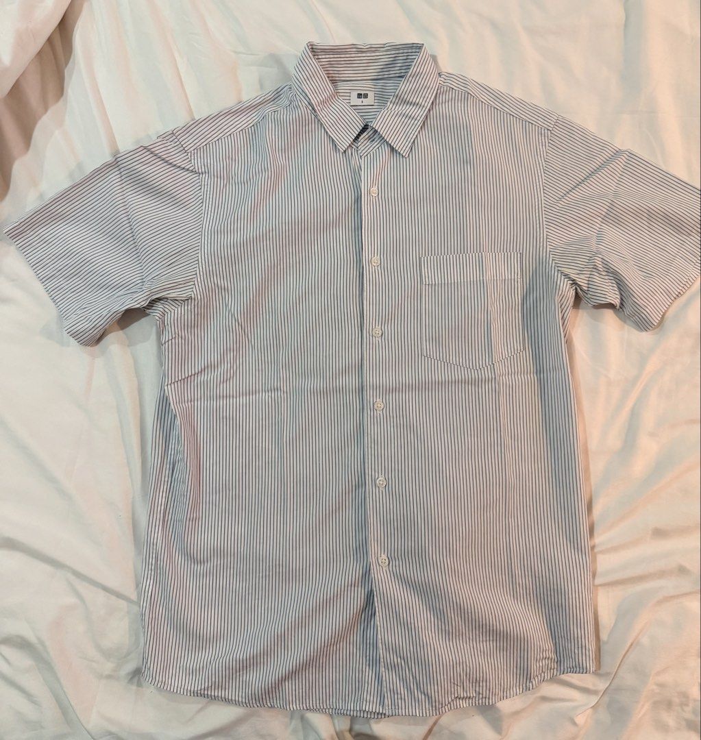 Uniqlo Blue and White Stripes Button Down Shirt (Category: Formal Shirts) located in Cebu City. Submitted by declutteringduo007 (Listing ID 1453184604, Image 1). Description: Uniqlo Blue and White Stripes Button Down Shirt Size: S.