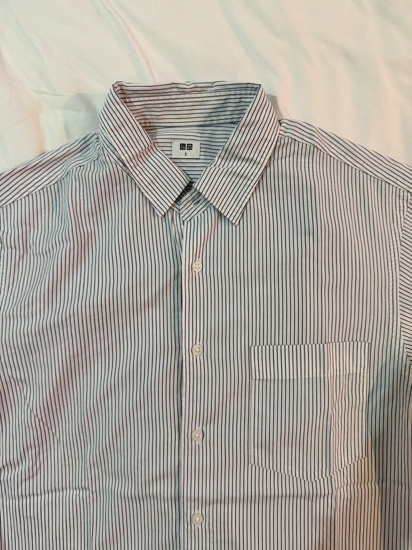 Uniqlo Blue and White Stripes Button Down Shirt (Category: Formal Shirts) located in Cebu City. Submitted by declutteringduo007 (Listing ID 1453184604, Image 2). Description: Uniqlo Blue and White Stripes Button Down Shirt Size: S.