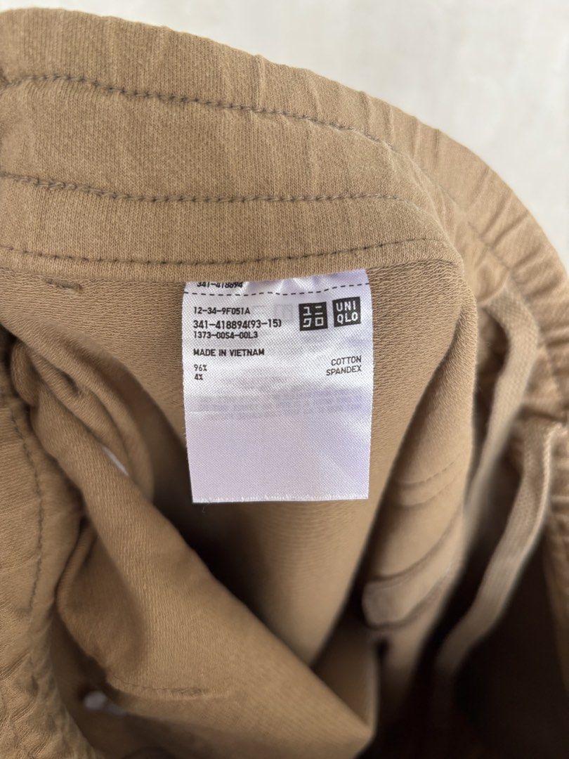 Uniqlo Cotton Spandex gartered trouser (Category: Trousers) located in Quezon City. Submitted by aaron.declutters (Listing ID 1453093865, Image 2). Description: - Uniqlo Joggers - Color: Tan/Khaki - Size: Small - Length: 35.5in - Material: Cotton-Spandex Blend - Features: Elastic waistband with drawstring, two side pockets - Perfect for: Everyday wear, lounging, casual outings.