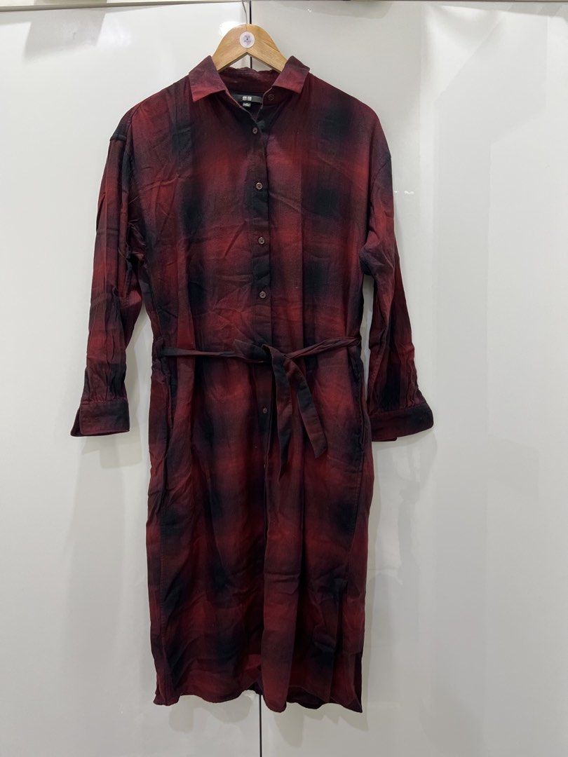 Uniqlo flannel dress (Category: Dresses) located in Bulacan. Submitted by levixxx (Listing ID 1453062215, Image 1). Description: - Uniqlo shirt dress - Classic red and black plaid pattern - Long sleeves with button cuffs - Includes matching fabric belt for waist definition - Full button-up front - Ideal for everyday casual wear.