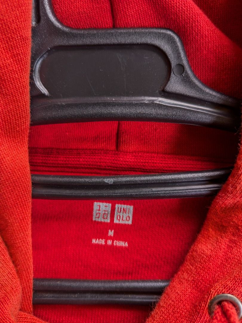 Uniqlo Hoodie Size M (Category: Hoodies) located in Mambajao. Submitted by growex (Listing ID 1453075998, Image 3). Description: - Red Uniqlo Hoodie - Size: Medium (M) - Material: Comfortable and warm, ideal for casual wear - Condition: As is (please check photos for details) - Origin: Made in China dimensions 21x28.
