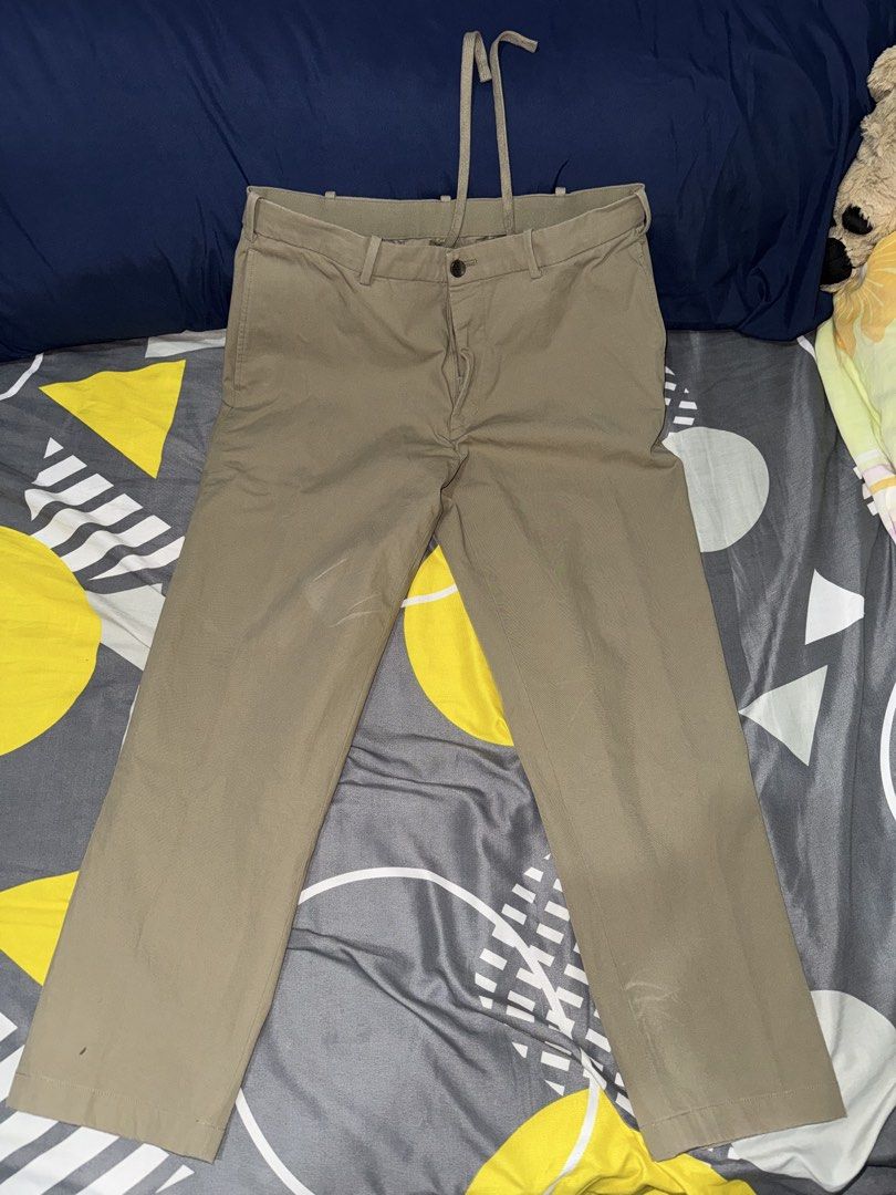 Uniqlo Smart Ankle Pants (Khaki) (Category: Chinos) located in Quezon City. Submitted by dcops (Listing ID 1453055733, Image 1). Description: Uniqlo Smart Ankle Pants (Khaki) - Waist 84-92cm - Used only for 3 times - In good condition - Last price posted, Orig Price is at 1990.