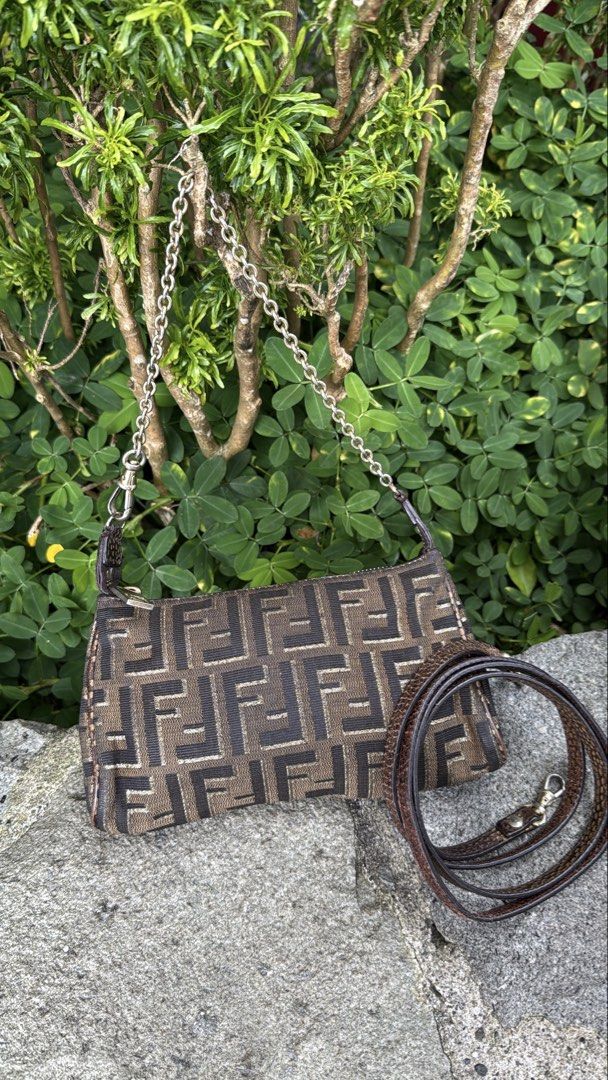 VINTAGE FENDI BAGUETTE (Category: Luxury Bags & Wallets) located in Baguio. Submitted by closetgc.clothingshop (Listing ID 1453070082, Image 2). Description: Vintage Fendi baguette Can be used as 2 way, Guaranteed Authentic Monogram design , Snake skin like strap and a chain strap all orig. Still in excellent condition for a vintage bag, clean inside and out. .