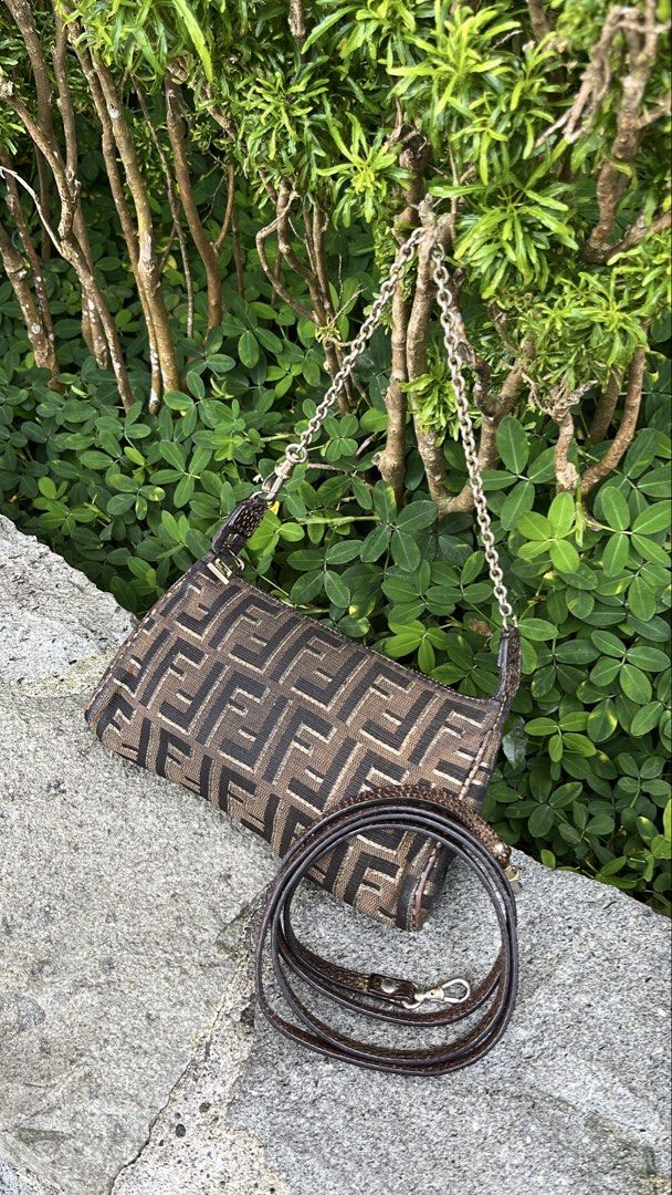 VINTAGE FENDI BAGUETTE (Category: Luxury Bags & Wallets) located in Baguio. Submitted by closetgc.clothingshop (Listing ID 1453070082, Image 3). Description: Vintage Fendi baguette Can be used as 2 way, Guaranteed Authentic Monogram design , Snake skin like strap and a chain strap all orig. Still in excellent condition for a vintage bag, clean inside and out. .