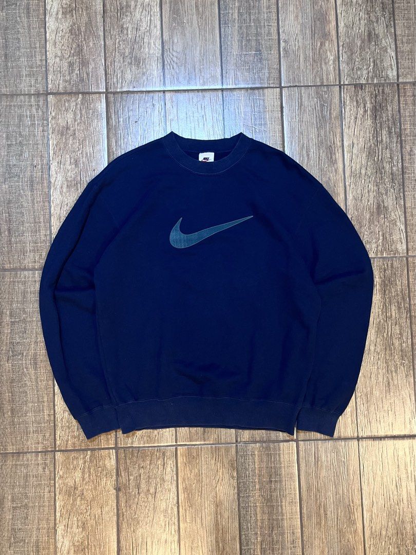 Vintage Nike Big Logo Crewneck (Category: Hoodies) located in Dagupan City. Submitted by harvey2005 (Listing ID 1453108044, Image 1). Description: Embroidered logo Excellent condition color rate 9/10 22 width 26 Length issue: none.