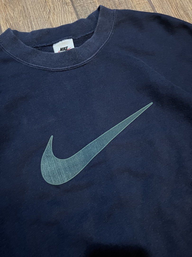 Vintage Nike Big Logo Crewneck (Category: Hoodies) located in Dagupan City. Submitted by harvey2005 (Listing ID 1453108044, Image 2). Description: Embroidered logo Excellent condition color rate 9/10 22 width 26 Length issue: none.