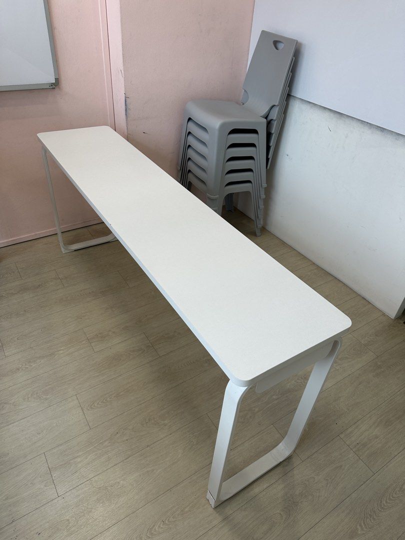 White study table (Category: Tables & Sets) located in Singapore. Submitted by ashice82 (Listing ID 1453096496, Image 1). Description: - Modern white table - Sturdy metal frame - Ideal for tuition centres I have 4 tables to sell Each at $30 Self collect.
