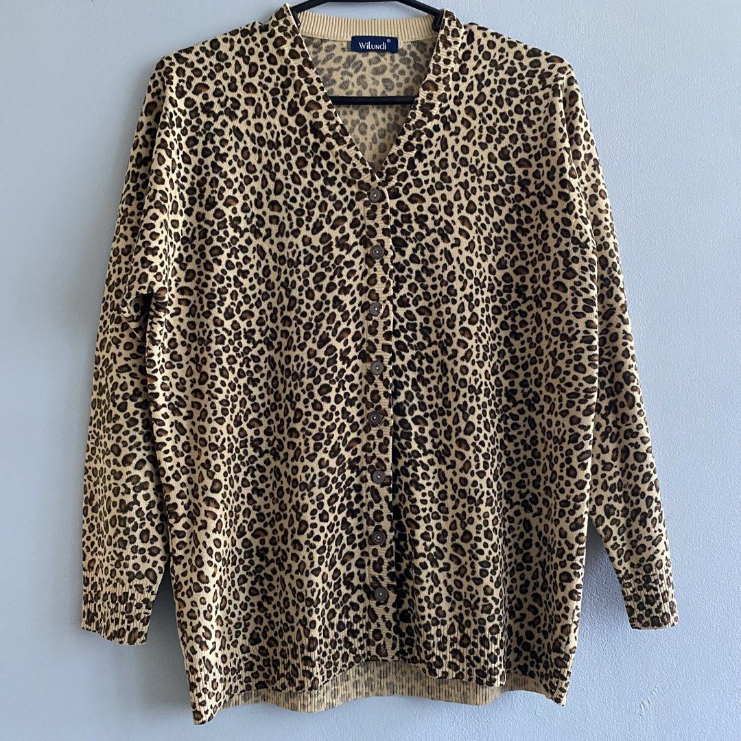 WILUNDI Leopard Print Button Up V-Neck Cardigan (Category: Coats, Jackets and Outerwear) located in Quezon City. Submitted by ndrmkl (Listing ID 1453162429, Image 1). Description: - Leopard print cardigan by Wilundi - Long sleeves with ribbed cuffs - Button-up with 8 buttons - Soft knit with a nice drape - Versatile layering piece for any outfit - Pairs well with jeans or can be dressed up Cardigan jumper sweater layer knits animal print statemen