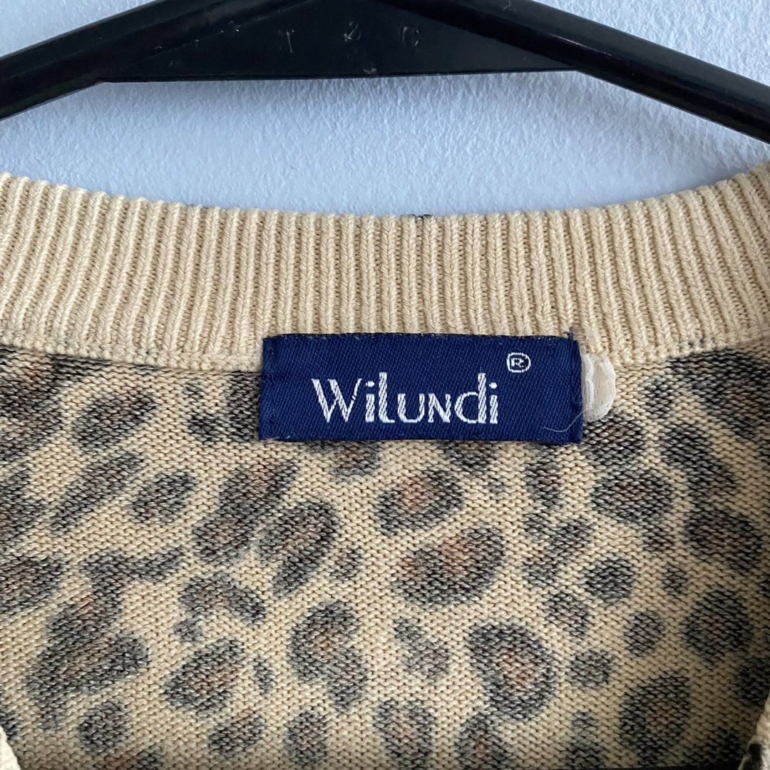 WILUNDI Leopard Print Button Up V-Neck Cardigan (Category: Coats, Jackets and Outerwear) located in Quezon City. Submitted by ndrmkl (Listing ID 1453162429, Image 3). Description: - Leopard print cardigan by Wilundi - Long sleeves with ribbed cuffs - Button-up with 8 buttons - Soft knit with a nice drape - Versatile layering piece for any outfit - Pairs well with jeans or can be dressed up Cardigan jumper sweater layer knits animal print statemen
