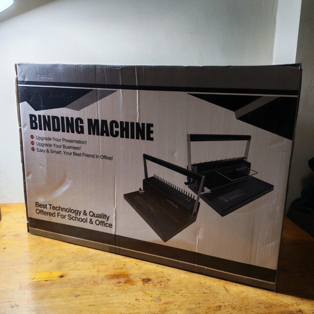 Wire binding machine (Category: Craft Supplies & Tools) located in Mandaluyong City. Submitted by kp_merch (Listing ID 1453203075, Image 1). Description: A4 size wire binding machine Max punching capacity: 12 sheets Max binding capacity: 140 sheets 34 punching holes Included: 14 unused binding rings Oslo papers Issues: Paint is peeling off in the handle (see last 2 photos).