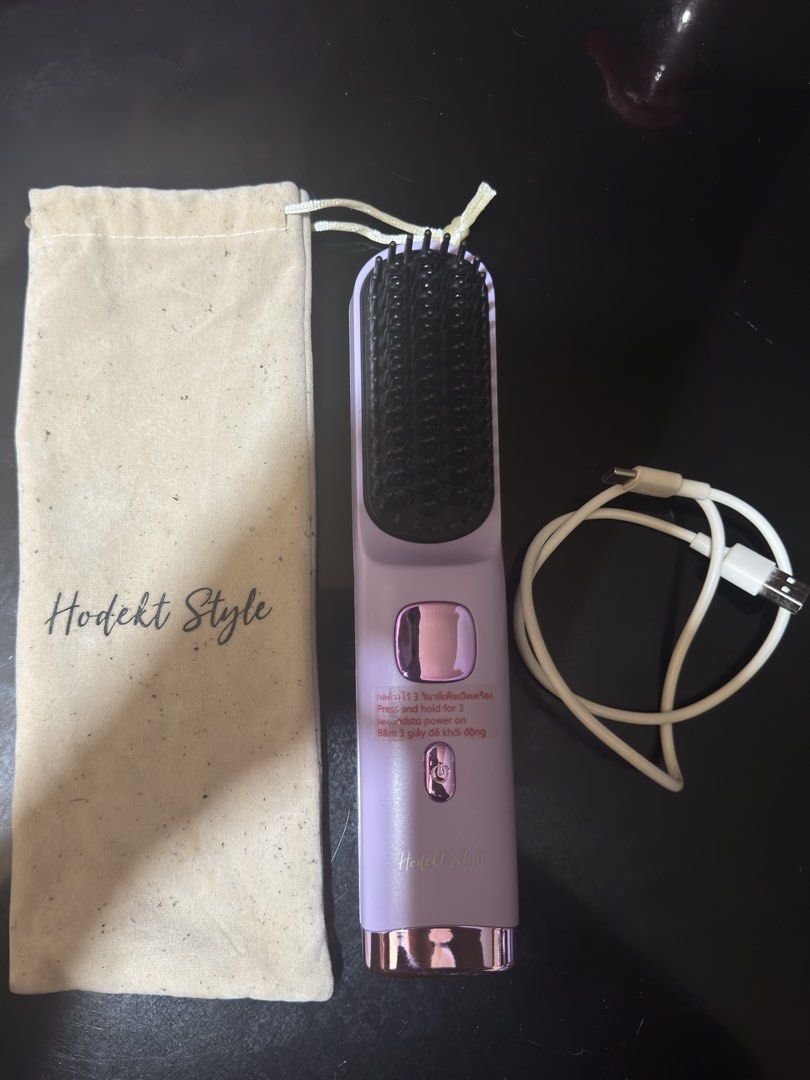 Wireless/Portable Comb Hair Straightener (Category: Hair) located in Manila. Submitted by archivebyjars (Listing ID 1453202417, Image 2). Description: Hodekt Wireless/Portable Comb Hair Straightener - comes with pouch and charging cord - price is negotiable 😊.