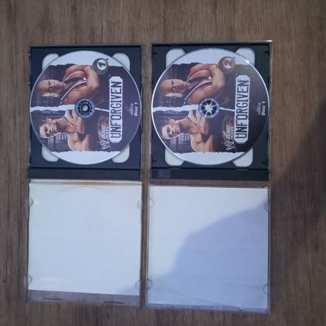 WWE Unforgiven 2005 Featuring John Cena v.s Kurt Angle . Disc 1&2 (Category: CDs & DVDs) located in Quezon City. Submitted by kreimark00 (Listing ID 1453198902, Image 2). Description: good condition pa naman po matagal lang na stock sa cabinet. two CD 500 pesos po..