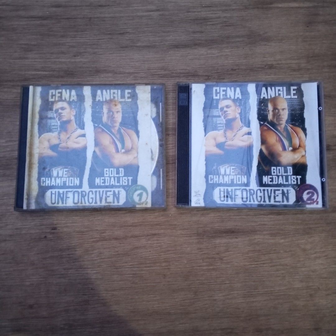WWE Unforgiven 2005 Featuring John Cena v.s Kurt Angle . Disc 1&2 (Category: CDs & DVDs) located in Quezon City. Submitted by kreimark00 (Listing ID 1453198902, Image 1). Description: good condition pa naman po matagal lang na stock sa cabinet. two CD 500 pesos po..