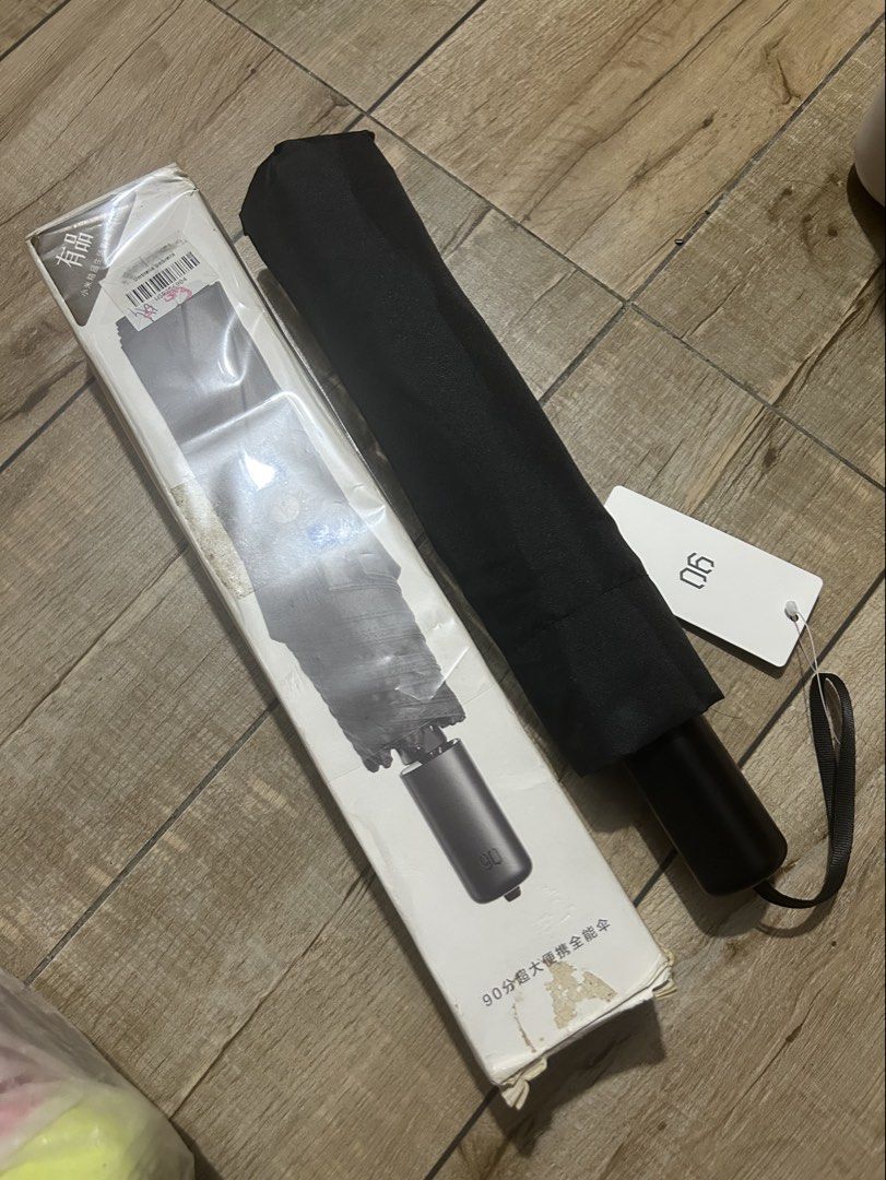 Xiaomi 90 Fun Manual Folding Umbrella Black (Category: Umbrellas) located in Paranaque City. Submitted by zac.sei (Listing ID 1453207457, Image 1). Description: - Xiaomi 90 Manual Folding Umbrella - Color: Black - Compact and portable design - Ideal for everyday use and unexpected rain showers - Includes original packaging and tag Features: Umbrella cloth waterproof high performance, easy shake off the water or the surface after heavy rain. Effic