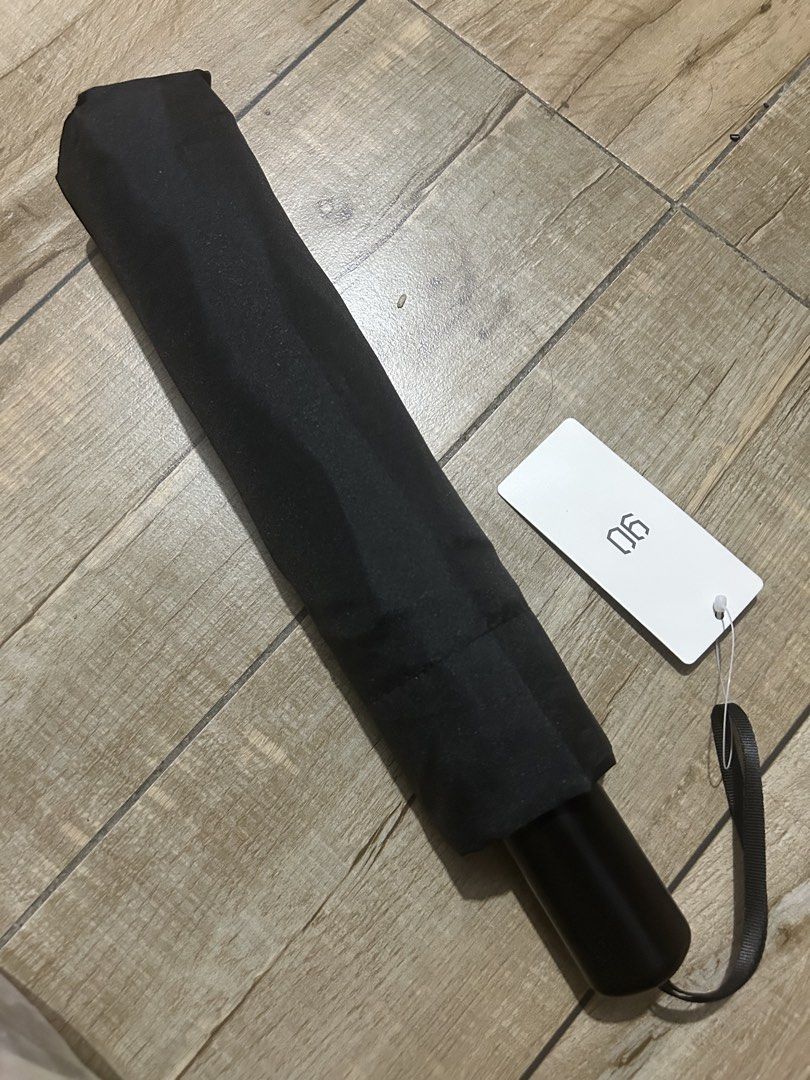 Xiaomi 90 Fun Manual Folding Umbrella Black (Category: Umbrellas) located in Paranaque City. Submitted by zac.sei (Listing ID 1453207457, Image 2). Description: - Xiaomi 90 Manual Folding Umbrella - Color: Black - Compact and portable design - Ideal for everyday use and unexpected rain showers - Includes original packaging and tag Features: Umbrella cloth waterproof high performance, easy shake off the water or the surface after heavy rain. Effic