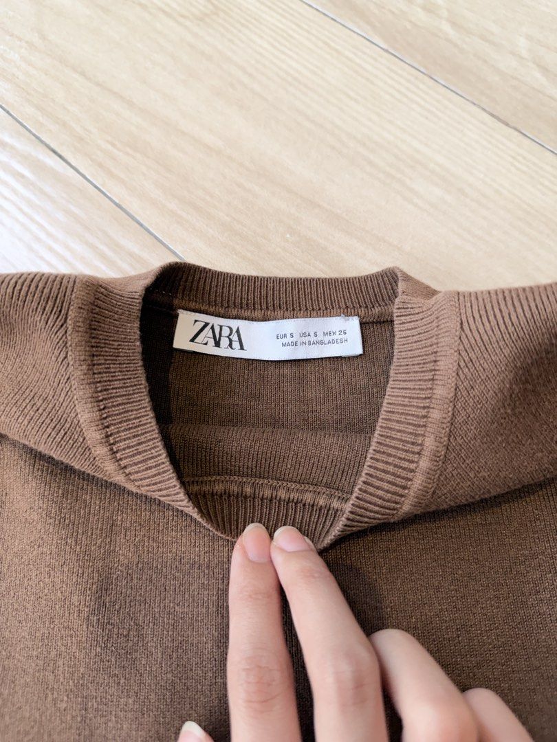 Zara Brown Sleeveless Knit Top Size S (Category: Sleeveless) located in Taytay. Submitted by ks.closet (Listing ID 1453214788, Image 3). Description: - Brand: Zara - Type: Knit Sleeveless Top - Color: Brown - Size: S - Texture: Ribbed - Measurements: Approx. 13" length, 15" width - Style: Simple, versatile, great for layering or wearing alone.