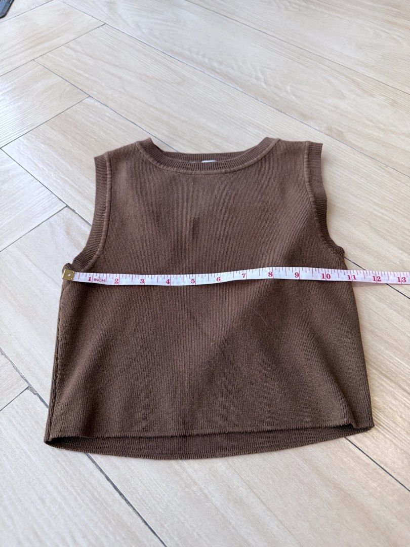 Zara Brown Sleeveless Knit Top Size S (Category: Sleeveless) located in Taytay. Submitted by ks.closet (Listing ID 1453214788, Image 2). Description: - Brand: Zara - Type: Knit Sleeveless Top - Color: Brown - Size: S - Texture: Ribbed - Measurements: Approx. 13" length, 15" width - Style: Simple, versatile, great for layering or wearing alone.