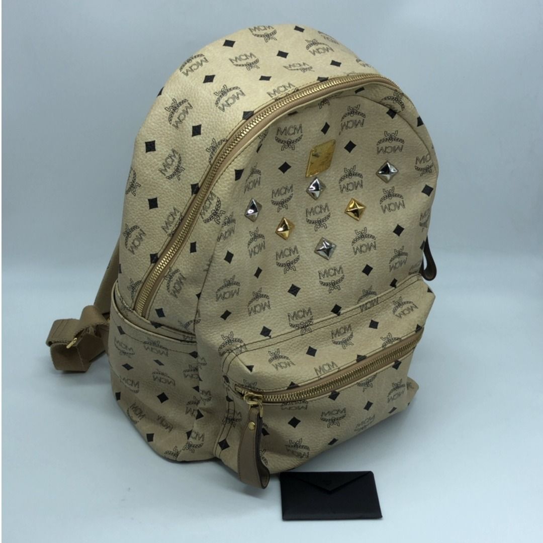 267007685 MCM BAG LEATHER BACKPACK STUDS (Category: Luxury Bags & Wallets) located in Taguig. Submitted by ecoring.ph (Listing ID 1454765588, Image 1). Description: ◆CONDITION: B ◆DESCRIPTIONS: (Other defects/info:) OUTER: The body of the bag is scratched, scuffed, stained, dirty, has minimal wrinkles, press marks, and shows signs of use. The bottom and bottom corners of the bag are also scratched, scuffed, stained, dirty, wrinkled, have press ma