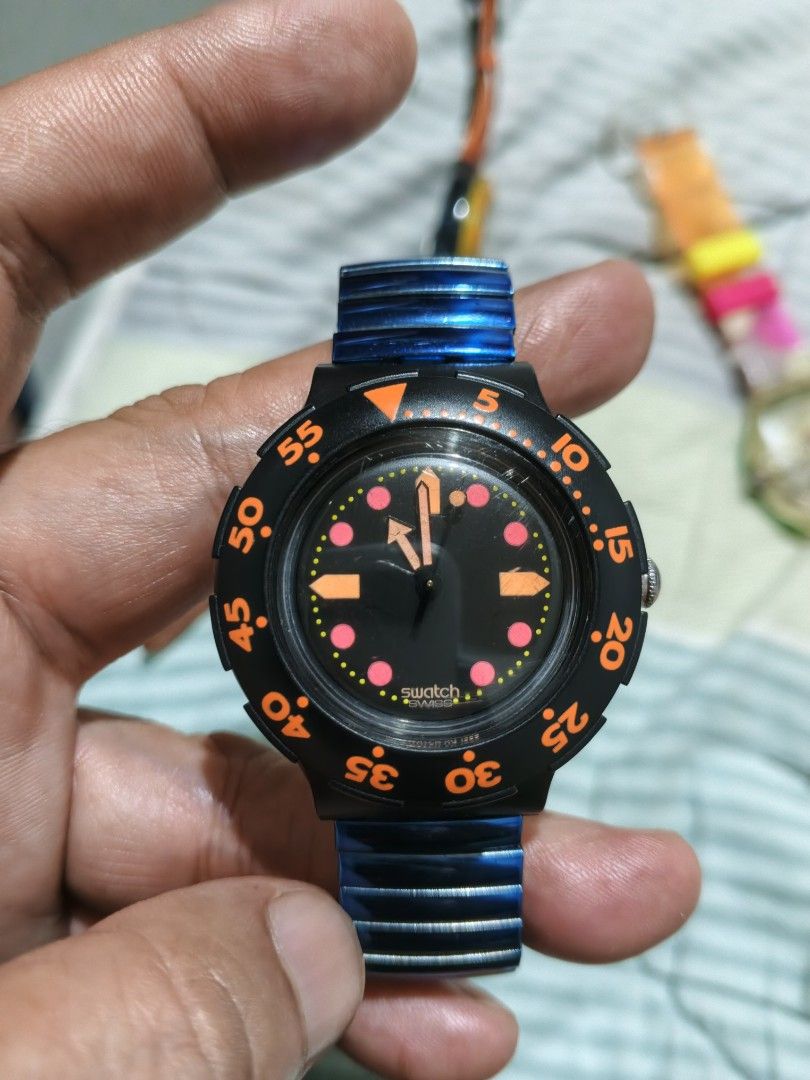 3 Swatch Watches - Orange, Green, Black (Category: Men's Watches) located in Cabuyao City. Submitted by treblig23 (Listing ID 1454781235, Image 3). Description: Swatch Scuba 200 bundle Php 5999.00 1. Starflash with orig leather strap 2. Seagrape with orig plastic strap 3. Barrier Reef Blk/Orange with replacemet metal strap. All working condition. Cabuyao, Laguna Area Swap with toys/game consoles ok!.