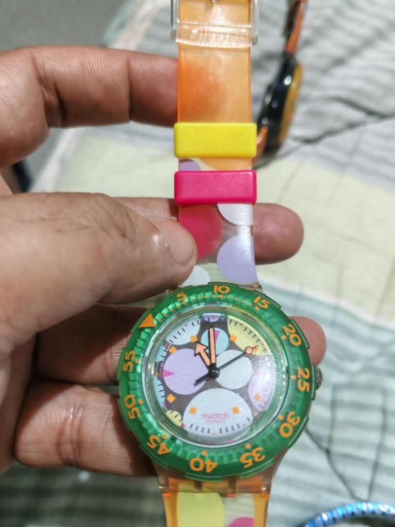 3 Swatch Watches - Orange, Green, Black (Category: Men's Watches) located in Cabuyao City. Submitted by treblig23 (Listing ID 1454781235, Image 2). Description: Swatch Scuba 200 bundle Php 5999.00 1. Starflash with orig leather strap 2. Seagrape with orig plastic strap 3. Barrier Reef Blk/Orange with replacemet metal strap. All working condition. Cabuyao, Laguna Area Swap with toys/game consoles ok!.