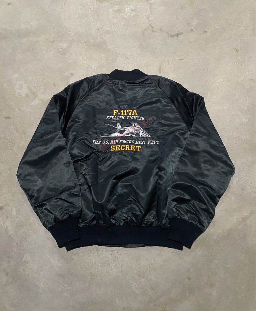 80s USAF - F-117A STEALTH FIGHTER JACKET (Category: Coats, Jackets and Outerwear) located in Naga. Submitted by junked_garments (Listing ID 1454812105, Image 2). Description: 80s USAF - F-117A STEALTH FIGHTER JACKET CONDITION: EXCELLENT COLOR RATE: 9/10 ISSUE: HOLE WIDTH 24” / LENGTH 27” DM ME TO PURCHASE!.
