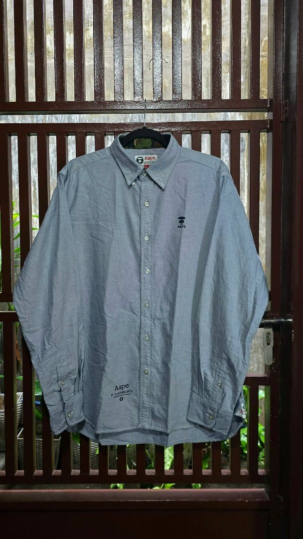 AAPE BY A BATHING APE Button Up Shirt (Category: Tshirts & Polo Shirts ) located in Quezon City. Submitted by hellovianx (Listing ID 1454922383, Image 1). Description: AAPE by A Bathing Ape Long Sleeve Oxford Button-Down Shirt Condition: 10/10 (no flaws) Tag Size: XL (Fits Large to Slim XL) Measurements: Width (Pit-to-Pit): 57 cm (22.4 inches) Length (Shoulder to Hem): 77.5 cm (30.5 inches).