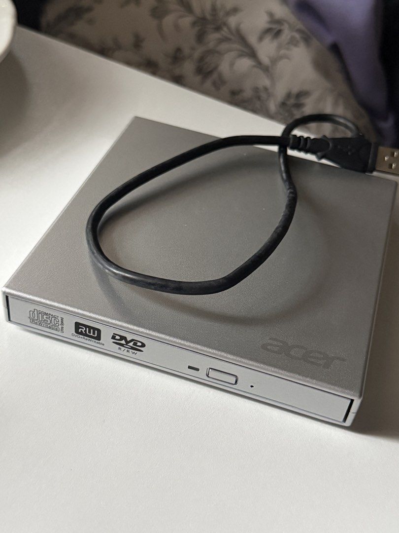 Acer External USB DVD RW Drive (Category: Hard Disks & Thumbdrives) located in Manila. Submitted by isabelaaaai (Listing ID 1454843439, Image 1). Description: still works well and in good condition. di nagamit masyado. no scratches or anything. .